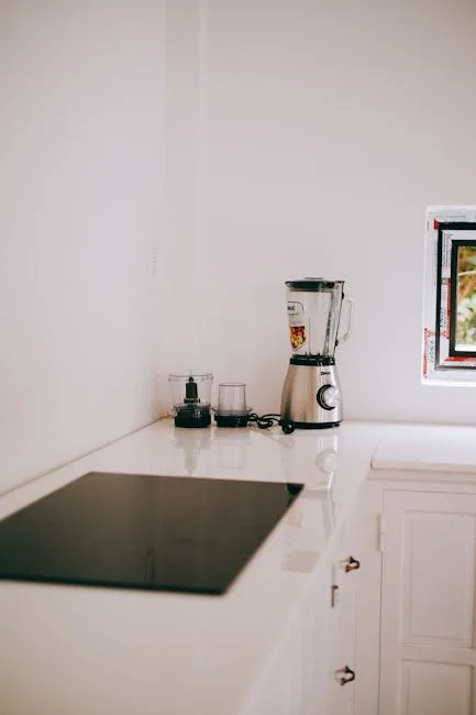 Minimalist Kitchen With A Single Appliance On The Countertops