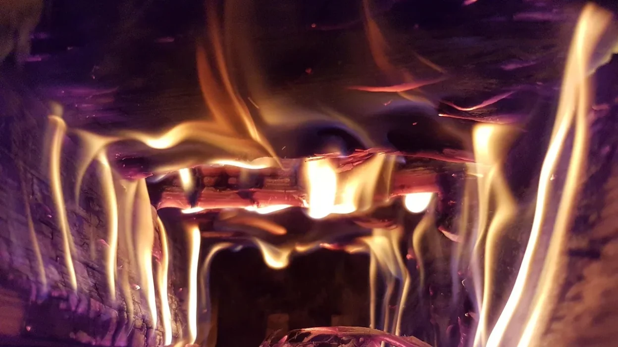 Homeowner performing a quick diagnostic check on a kitchen oven for slow heating and uneven cooking issues.