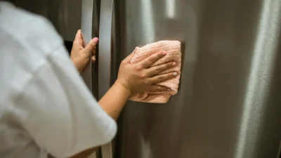 Guide to cleaning stainless steel, glass, and ceramic cooking appliance surfaces with proper tools