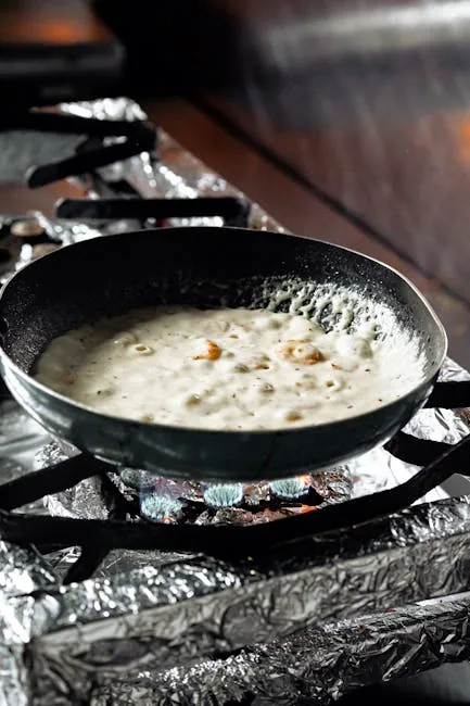 Stovetop Skillet On A Burner Demonstrating Energy-saving Cooking