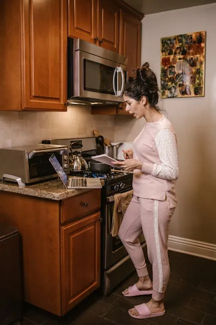 Person Cooking A Small Meal With Toaster Oven And Microwave